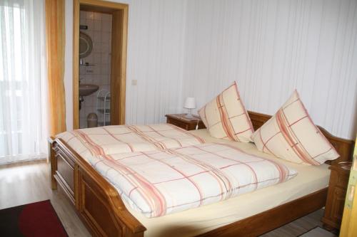 Ένα ή περισσότερα κρεβάτια σε δωμάτιο στο Weinfelderhof
