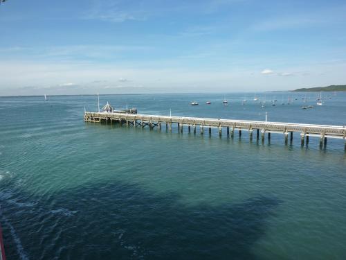 an aerial view of a dock in the water at The George Hotel and Beach Club in Yarmouth