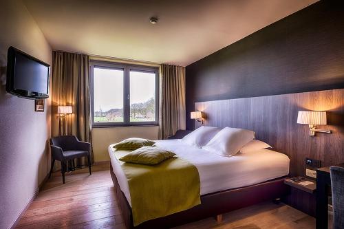 Postel nebo postele na pokoji v ubytování Cleythil Hotel