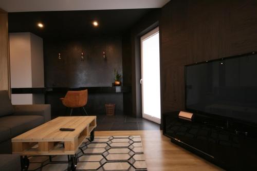 Posezení v ubytování APARTAMENT ZAGNAŃSKA - Garaż