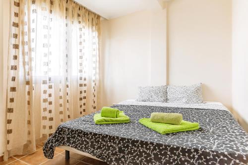 Postel nebo postele na pokoji v ubytování Townhouse La Tejita
