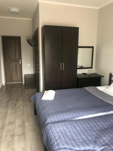 Ein Bett oder Betten in einem Zimmer der Unterkunft Motozona