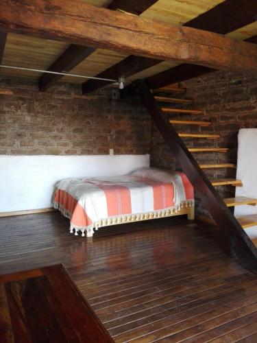 Postel nebo postele na pokoji v ubytování Casa del siglo XVII