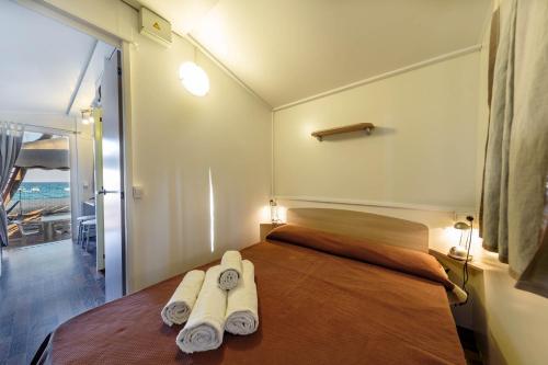Postel nebo postele na pokoji v ubytování Camping&Village Le Cernie