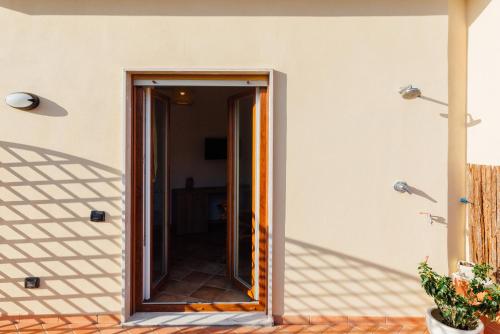 a doorway into a house with a mirror at Vista Mare B&B in Sorrento