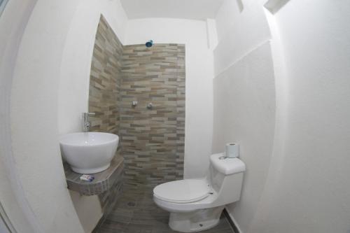 Ванная комната в Hotel San Carlos