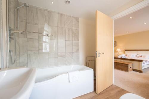 Katil atau katil-katil dalam bilik di The Lodge at Broadway
