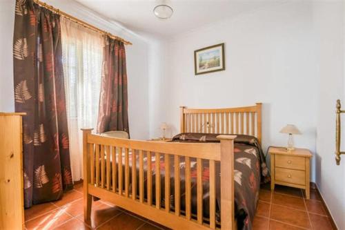 Postel nebo postele na pokoji v ubytování Rural El Puerto Mayordomo
