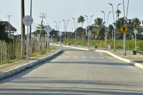 an empty road with street signs on the side at Gran Muelle Hotel in San Bernardo del Viento