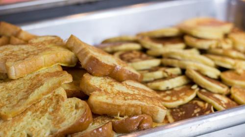a tray filled with different types of pastries at Punta Sal Suites & Bungalows Resort in Canoas De Punta Sal