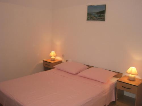 Posteľ alebo postele v izbe v ubytovaní Apartments Baric