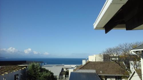 a view of the ocean from a city at Franmarel in Plettenberg Bay