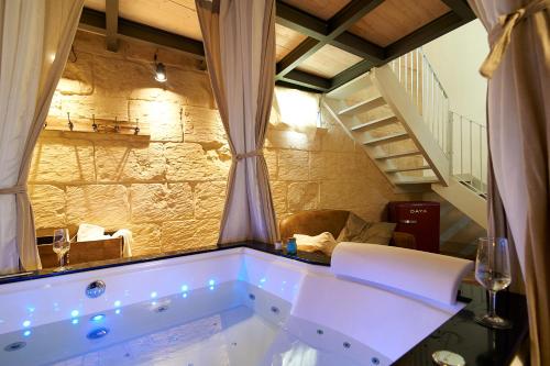 Ett badrum på Palazzo Mandurino luxury relais