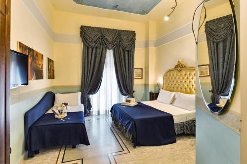 Cama o camas de una habitación en Hotel Art Resort Galleria Umberto