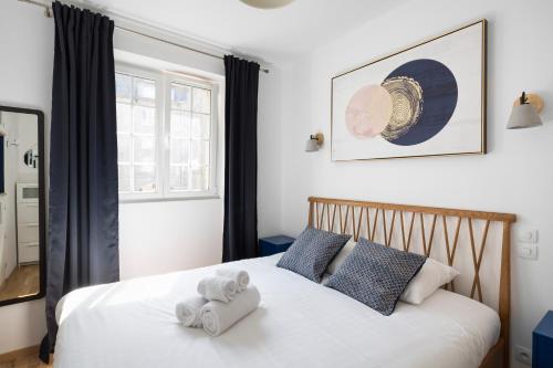 Postel nebo postele na pokoji v ubytování L'Aurore by Cocoonr