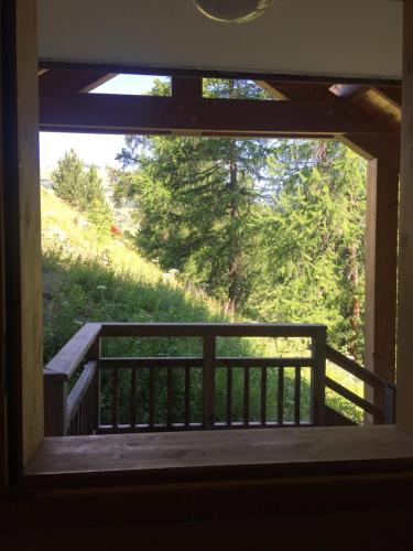 a view from the inside of a screened in porch at Duplex Familial à Vars, Chalets des Rennes in Vars