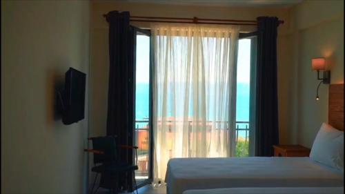 Letto o letti in una camera di 8 Rooms Hotel
