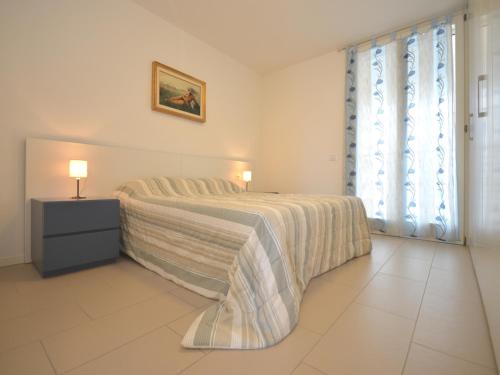 Postel nebo postele na pokoji v ubytování Torre Jumeira