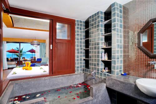 Kylpyhuone majoituspaikassa Weekender Resort