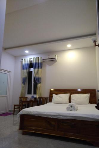 Ένα ή περισσότερα κρεβάτια σε δωμάτιο στο The Muine Eco Home