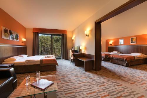 Postel nebo postele na pokoji v ubytování Hotel Kawallo