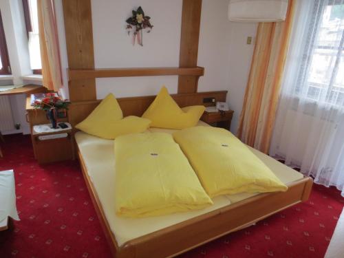 Ліжко або ліжка в номері Alpenhäusl