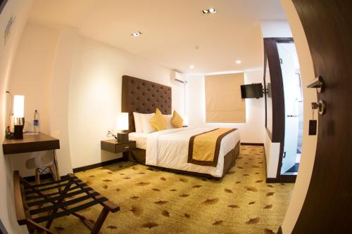 Posteľ alebo postele v izbe v ubytovaní City Hotel Colombo 02