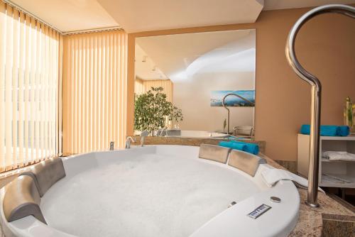 Koupelna v ubytování Hotel Kawallo
