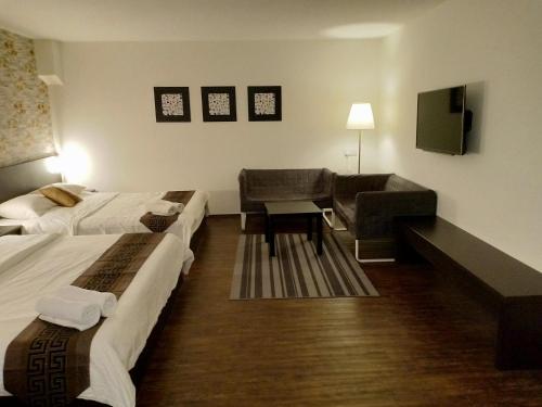 Katil atau katil-katil dalam bilik di 52 The Grace hotel