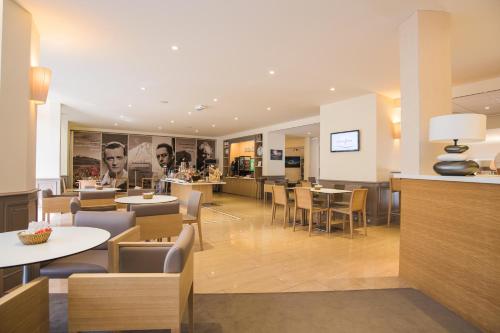Un lugar para sentarse en Best Western Sévan Parc Hôtel