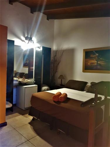 Cama o camas de una habitación en Si Mi Capitán - Cabañas & Habitaciones