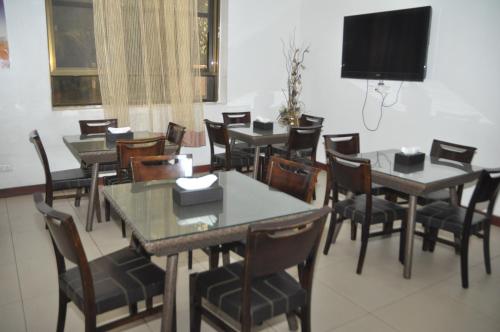 TV a/nebo společenská místnost v ubytování Hotel de Mag (Plaza)