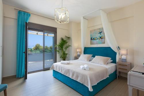 Ένα ή περισσότερα κρεβάτια σε δωμάτιο στο Anesis Villa, spacious & cozy, By ThinkVilla