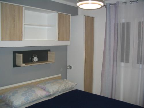 Posteľ alebo postele v izbe v ubytovaní Apartment Amfora on the ground floor