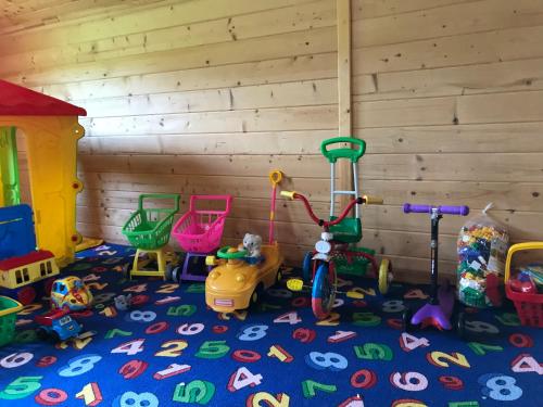 a room filled with toys on the floor at Georgiy in Oryavchyk