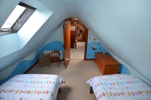 A bed or beds in a room at 6 Seatown, Lossiemouth