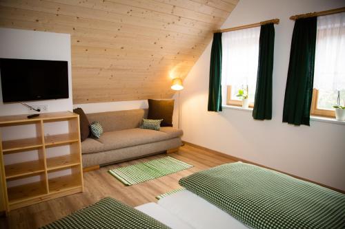 Postel nebo postele na pokoji v ubytování Ferienhaus Schleinzer