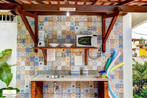 A cozinha ou cozinha compacta de Pousada Portal da Concha