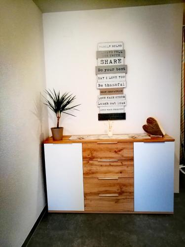 a counter with a sign on a wall at Apartment Kogler in Fügen