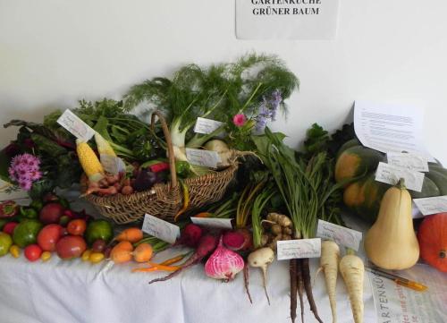 a bunch of fruits and vegetables on a table at Gasthof Grüner Baum in Kirchberg am Wechsel
