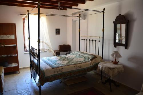 En eller flere senge i et værelse på Stone House