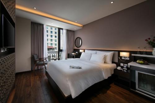 Katil atau katil-katil dalam bilik di Grandiose Hotel & Spa