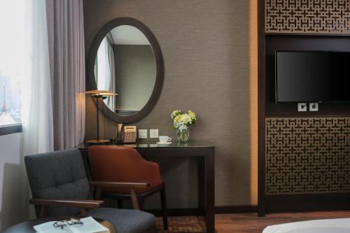 Televisyen dan/atau pusat hiburan di Grandiose Hotel & Spa