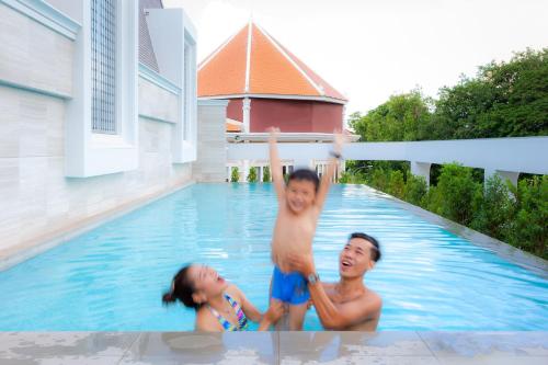 The swimming pool at or near ibis Styles Siem Reap