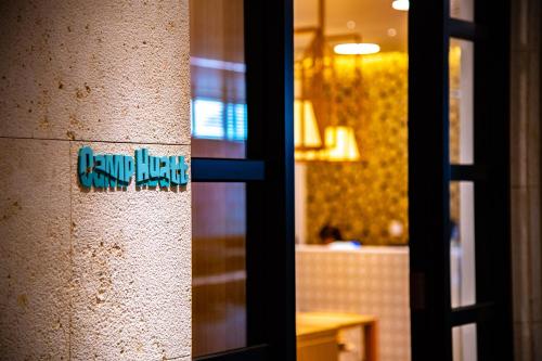 a sign on the side of a wall at Hyatt Regency Seragaki Island Okinawa in Onna