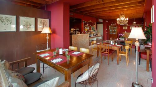 Le Greghe Suitesにあるレストランまたは飲食店