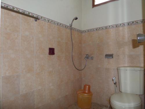 Koupelna v ubytování Armi Hotel Malang