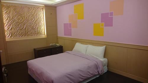 Cama o camas de una habitación en Umin Chu Inn