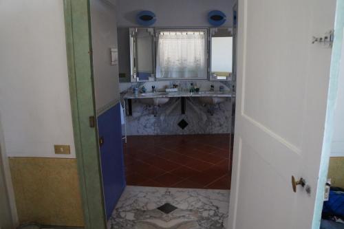 Koupelna v ubytování Palazzo Bernardini B & B