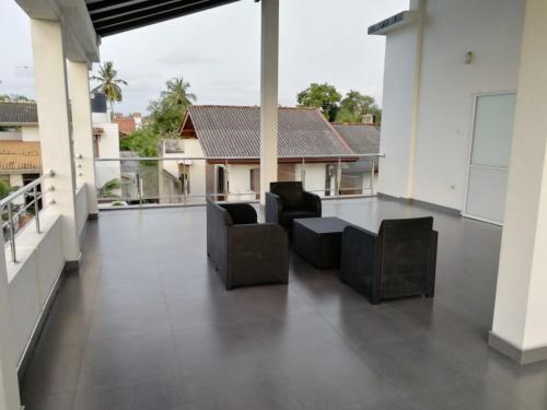 Balkoni atau teres di Wishing Well Apartment